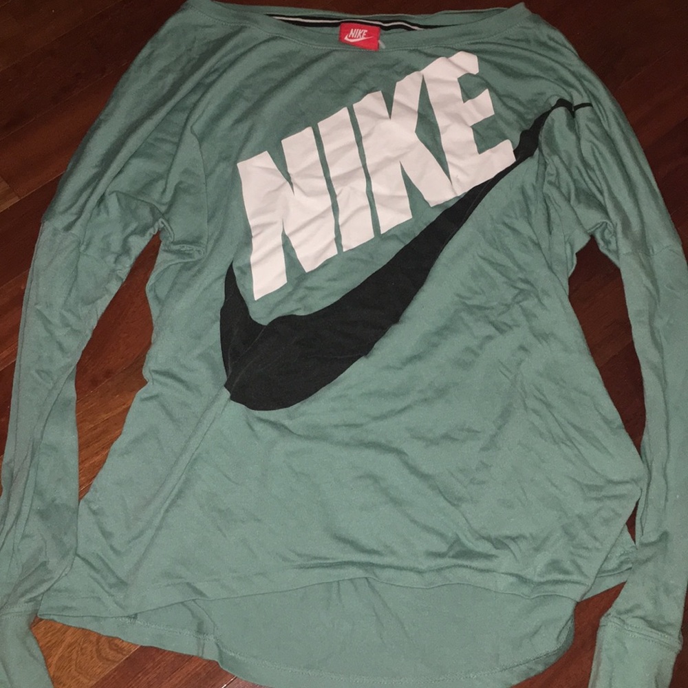 Long sleeved Turquoise Nike shirt